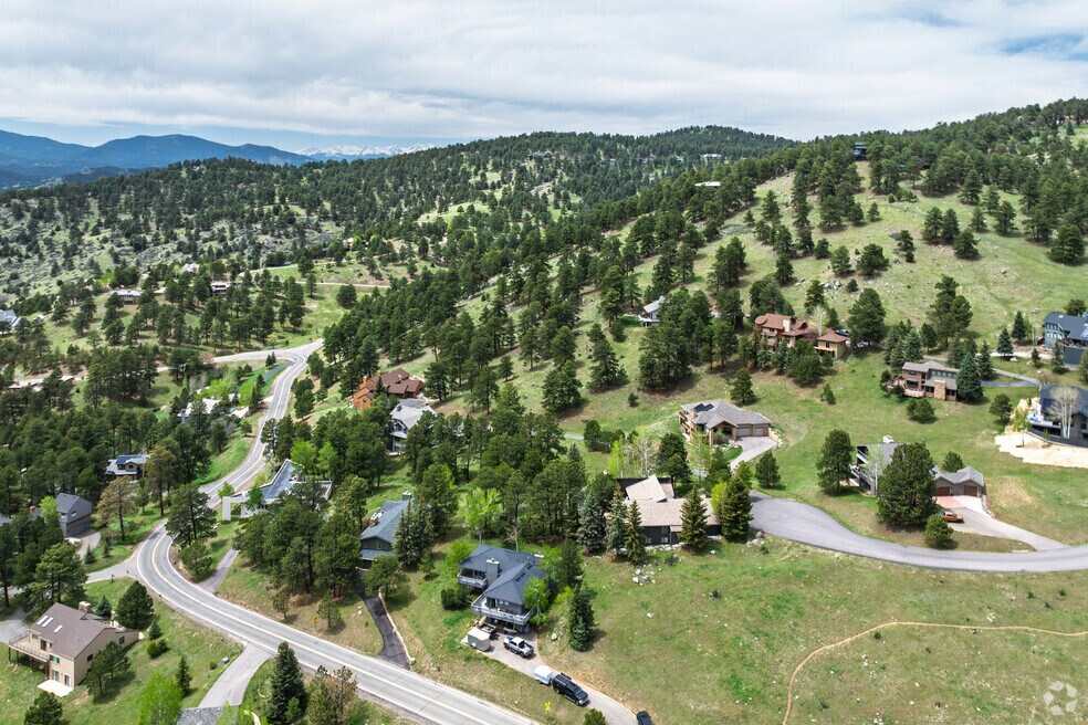 Genesee Colorado mountain homes aerial with pines