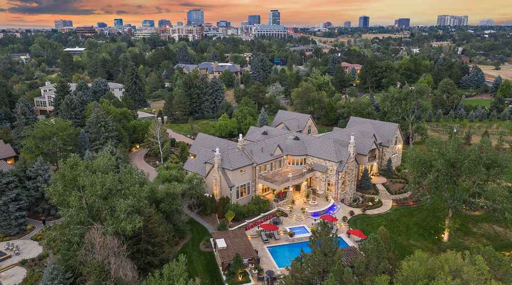 Cherry Hills Village estate at dusk with DTC skyline